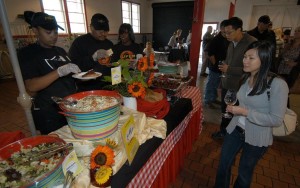 E and J staff serves your on-site catering    